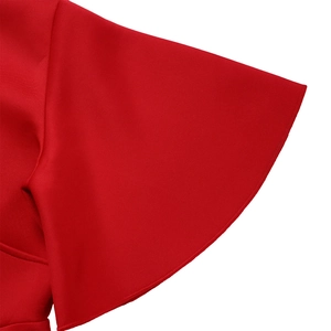 Detailed view of elegant red flare sleeves with professional stitching on a V-neck dress