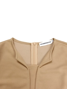 Close-up of beige V-neck dress with seamless back zipper and brand size label