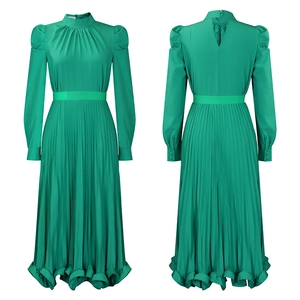 Front and back view of emerald green pleated two-piece set with puff sleeves and belted waist
