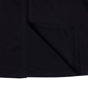 Detailed close-up showing the premium double-needle hem stitching on the black pencil dress