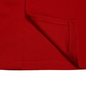 Detailed close-up of red knit fabric with professional double-needle stitching and texture