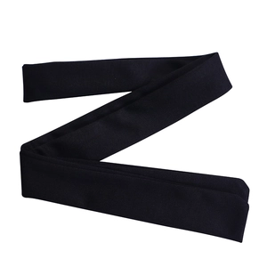 Detail of black rib-knit elastic belt for elegant V-neck pencil dress accessory