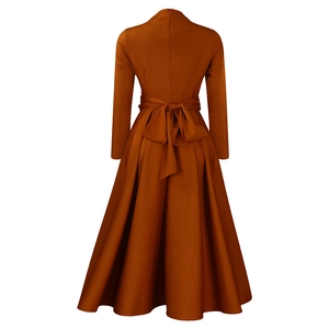 Detail view of caramel pleated dress back with concealed zipper and waist bow tie