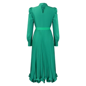 Detail view of emerald green dress back with pleated skirt and elegant bubble sleeves