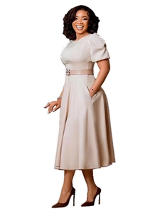 Elegant apricot A-line midi dress with puff sleeves and decorative bird buckle belt