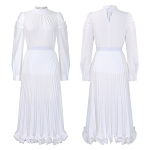 Detailed view of white pleated two-piece set featuring a high neck design and ruffled hemline