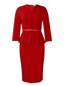 Detail of red business suit with V-neck, peplum hem and matching belt with silver buckle