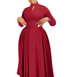 Detail of the high-neck neckline with water-drop cutout on burgundy pleated maxi dress