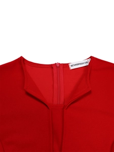 Close-up of red V-neck dress with hidden back zipper and high-quality stitched neckline