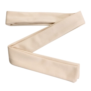 Detailed view of beige ribbed elastic fabric showing high-quality knitted texture and soft weave