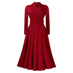 Close-up of the wine red dress with keyhole neckline and pleated waist detail