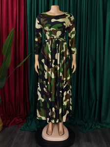 Detail of long sleeve maxi dress featuring woodland camouflage print and drawstring waist