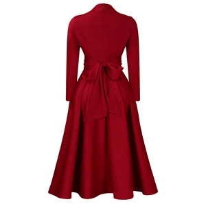 Detailed back view of a dark red maxi dress showing an elegant large bow on the waistline