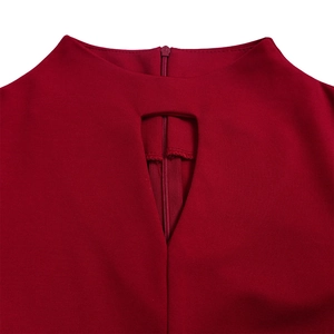 Macro detail of dark red dress with keyhole cutout and invisible zipper at the collar