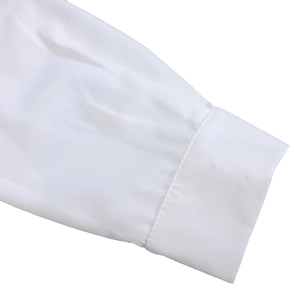 Close-up of white puff sleeve cuffs with pleated texture on casual two-piece sets