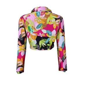 Back view of a cropped long-sleeve shirt featuring a vibrant tropical floral print and collar