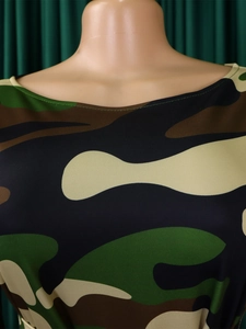 Detail of boat neck neckline on camouflage print midi dress with neat stitching