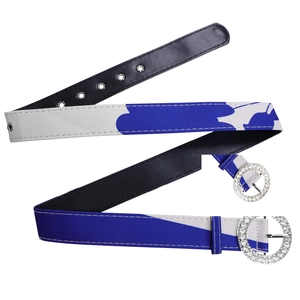 Detail of blue and white floral fabric belt with rhinestone-encrusted round metal buckle