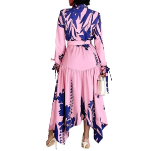 Back view of pink floral print dress with irregular hem and sleeve tie details
