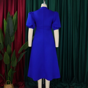 Detail view of royal blue dress back with hidden zipper and puff sleeves design