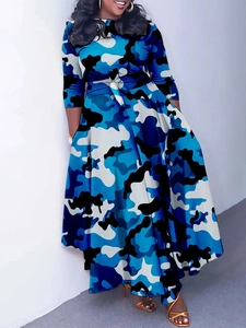 Detail view of plus size blue camouflage print maxi dress with waist tie and flared hem