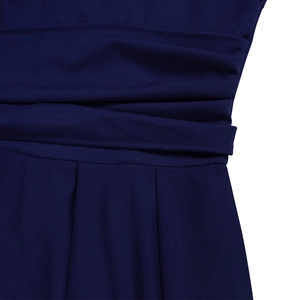 Detailed view of dark blue ruched waist design on a pleated maxi dress with quality stitching
