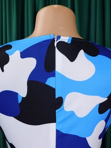 Detail of invisible back zipper on a blue camouflage print dress for women