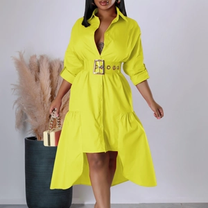 Detail of yellow shirt dress with waist belt and asymmetrical high-low hem design
