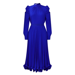 Detail of royal blue puffed sleeves with cold-shoulder cutouts on pleated dress