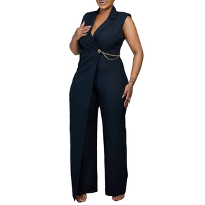 Detail of navy sleeveless jumpsuit with tuxedo collar and gold chain belt waist buckle