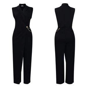 Front and back view of a black sleeveless jumpsuit with gold buckle and chain details