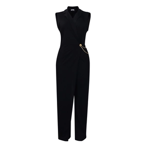 Detail of black sleeveless jumpsuit with gold lion head buttons and metal chain decor
