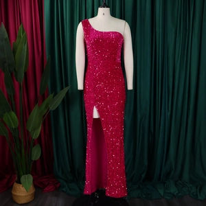 Detail of sequined one-shoulder evening gown with high slit in hot pink