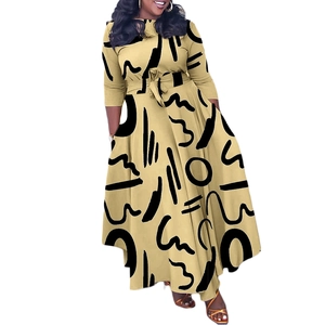 Detailed view of khaki dress with black abstract print and belted waist design