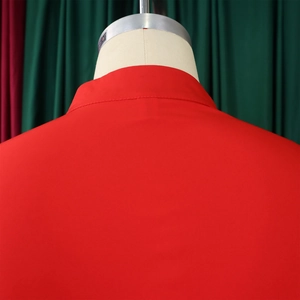 Detail view of the stitching and collar on this red flare sleeve button-down maxi dress