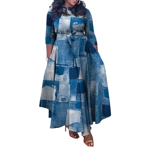 Close-up of lightweight blue patchwork denim print maxi dress with belted waist design
