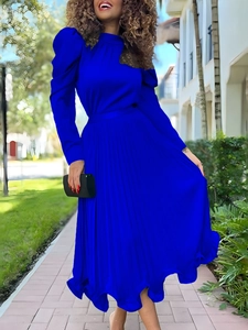 Royal blue pleated long dress with puff sleeves and high neck for a stylish autumn look