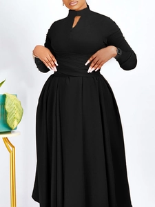 Elegant long-sleeve black pleated maxi dress with keyhole neckline and ruched waist