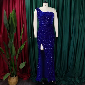 Detail view of royal blue one-shoulder sequin evening dress with high slit and shimmering fabric