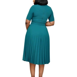 Back view of a dark green pleated midi dress with short sleeves and a slim waist belt