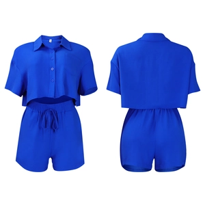Bright blue two-piece set featuring short-sleeve button-down shirt and drawstring shorts