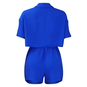 Rear view of cobalt blue short sleeve shirt and elastic waist shorts summer set