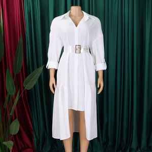 Detail view of white shirt dress with asymmetric hem and transparent belt with buckle