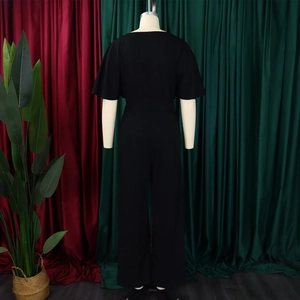 Back view of a black high-waisted wide-leg jumpsuit with short sleeves and round neck