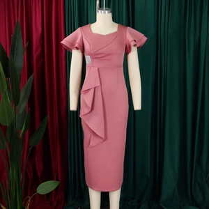 Detail of pink bodycon dress featuring double ruffle sleeves and a crystal waist buckle