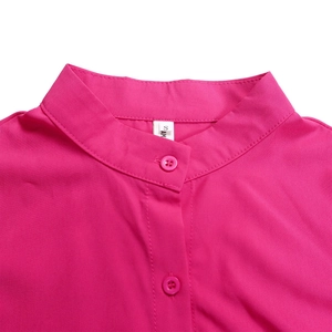 Detail of rose red dress collar with stand-up neckline and matching resin buttons
