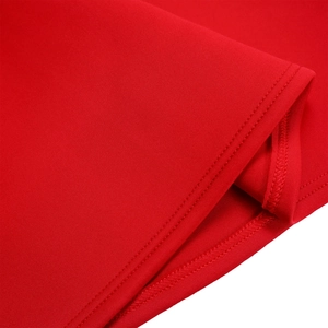 Close-up of the professional double-needle stitching and neat hem on red fabric
