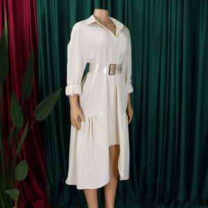 Detail of off-white button-down shirt dress featuring a ruffled hem and transparent waist belt