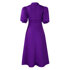 Detail view of the back of a purple puff sleeve dress with zipper and stand collar