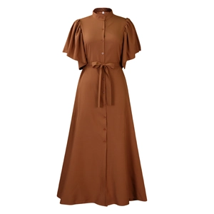 Detail of caramel shirt dress with flare sleeves, button closure, and matching waist tie